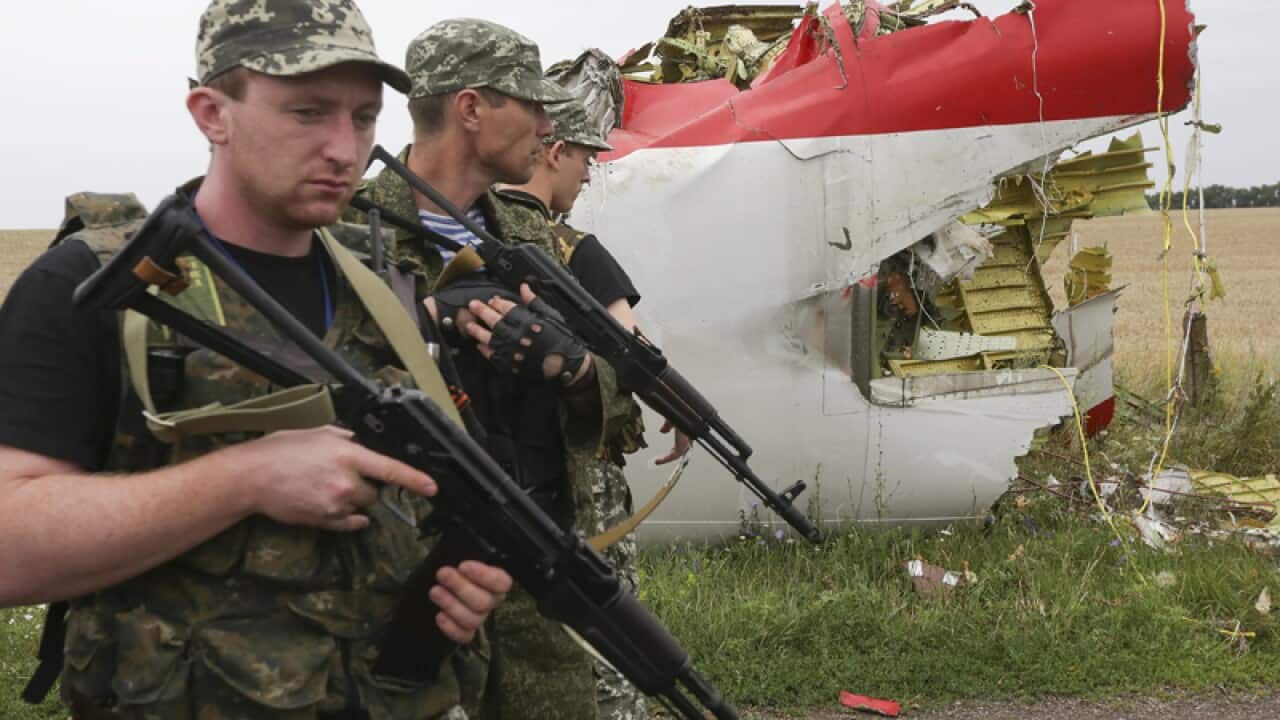 Pro Russian rebels at the crash site of Malaysia Airlines flight MH17