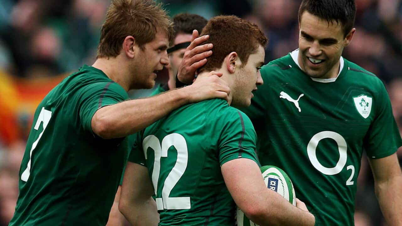 Ireland's Paddy Jackson (centre) with team-mate Chris Henry (left)