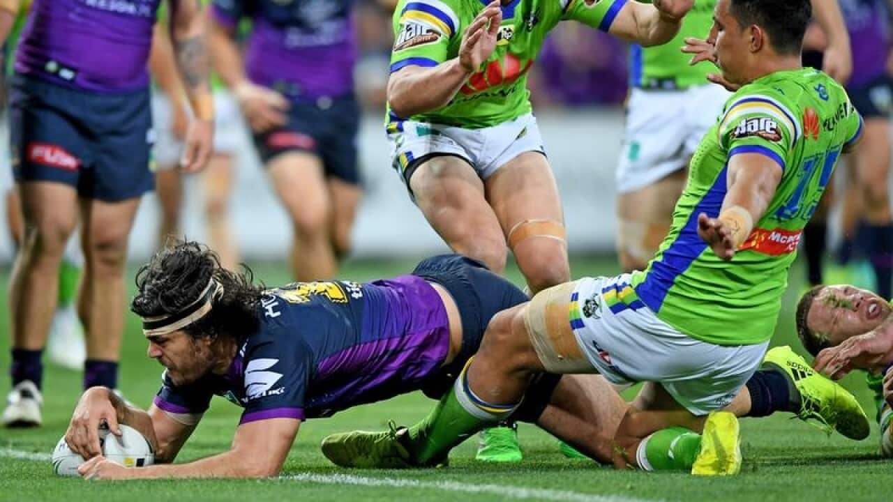 Tohu Harris of the Storm scores a try, during the Round 26 NRL.