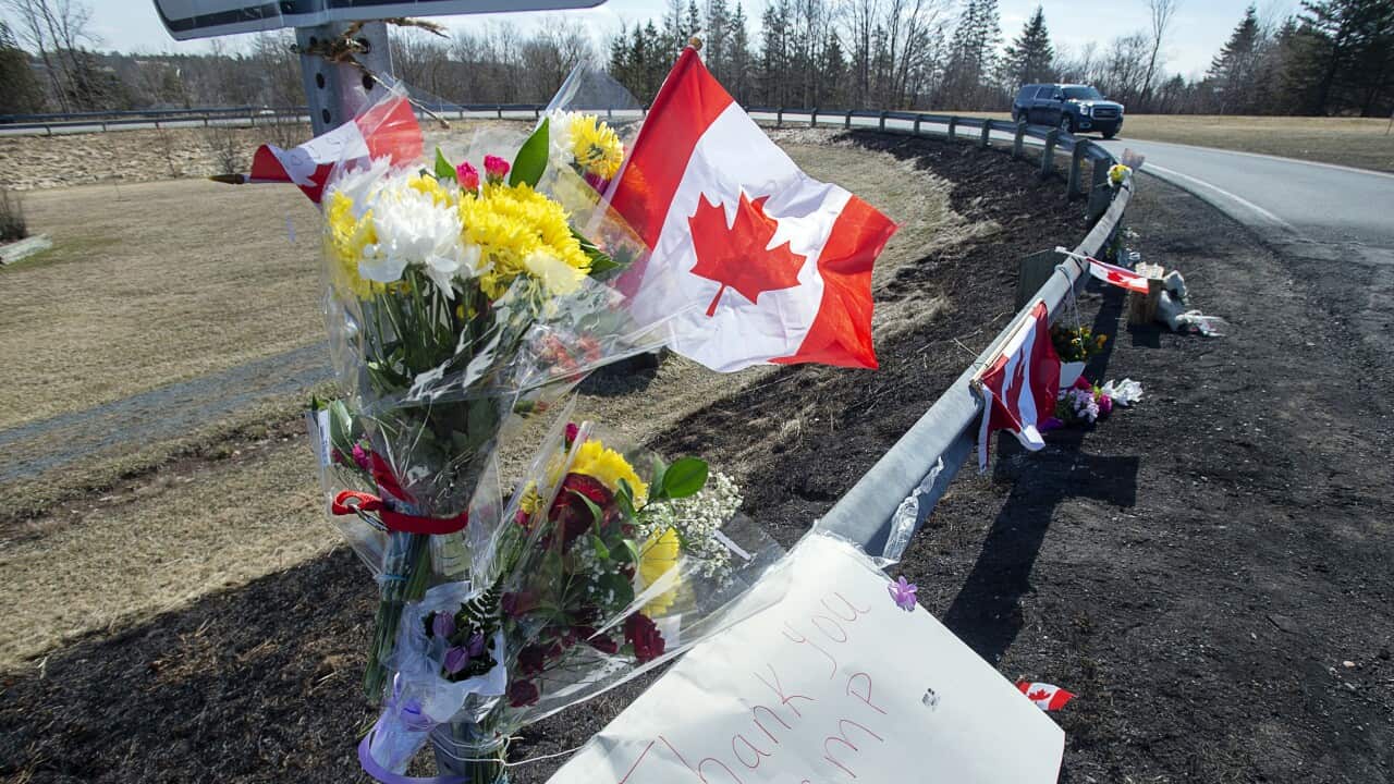 A memorial pays tribute to victims of Canada's gun massacre.