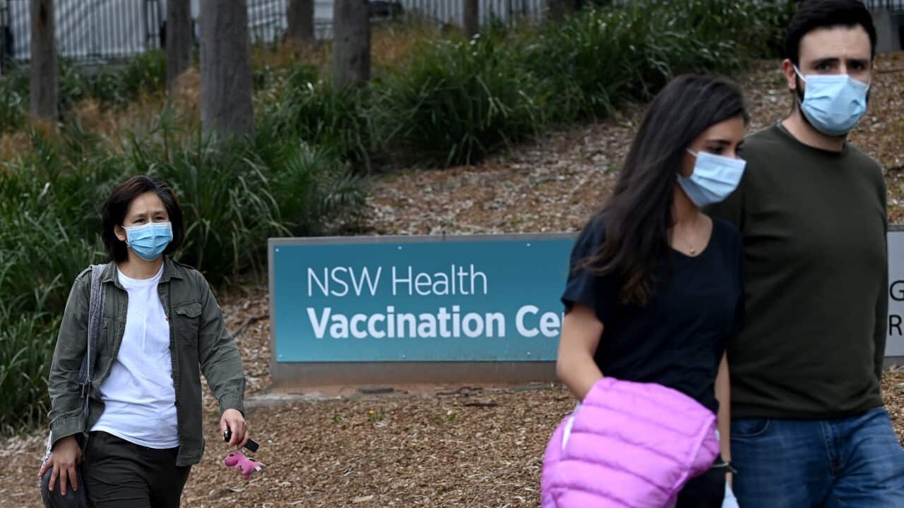 Members of the public line up at the NSW Health Vaccination Hub at Sydney's Olympic Park (AAP)