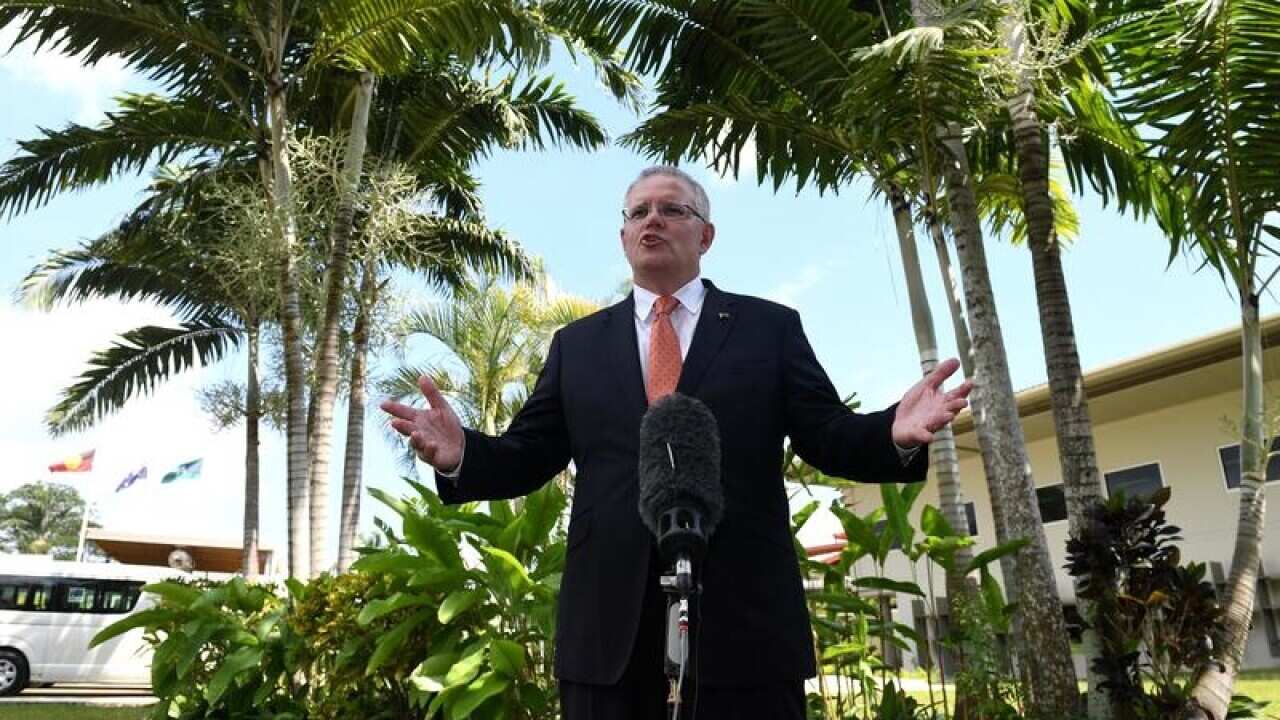 Scott Morrison has made a flying visit to Port Vila on his way to Suva.