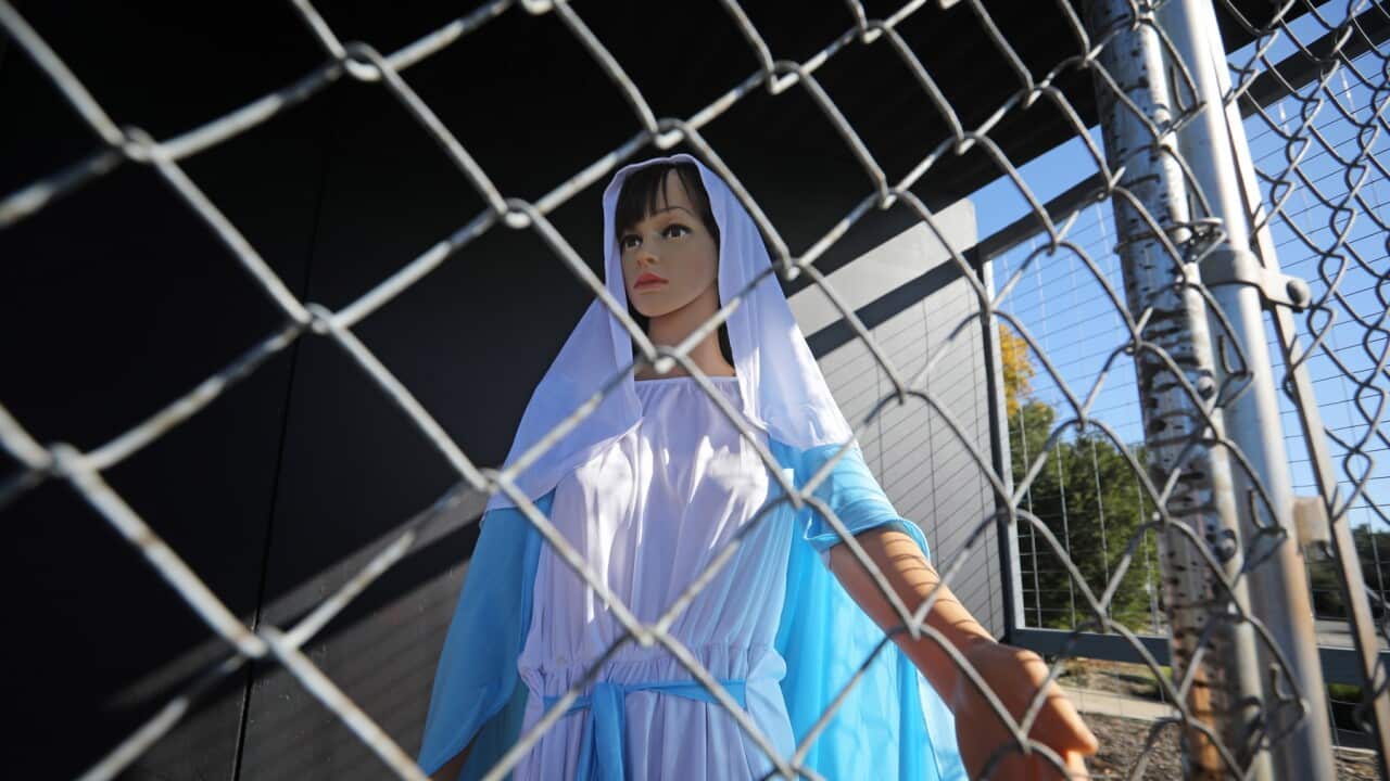 A statue of Mary caged in California