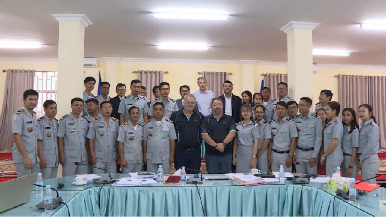 Australian experts show Cambodian officials the dangers of asbestos on construction materials