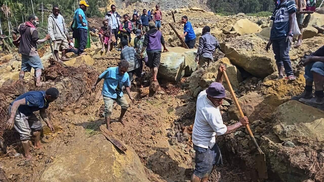 People searching a landslide