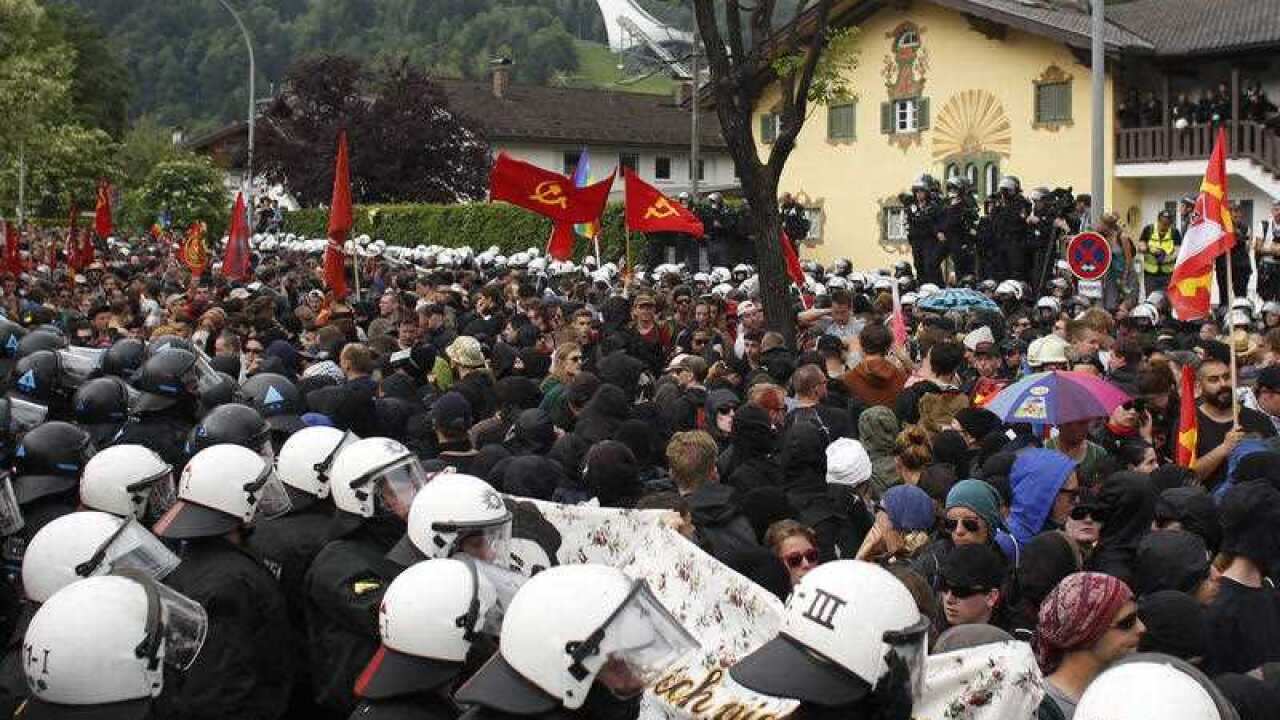 A protest march in Garmisch-Partenkirchen, southern Germany, June 6, 2015 against the G7 summi. (AP Photo/Markus Schreiber)