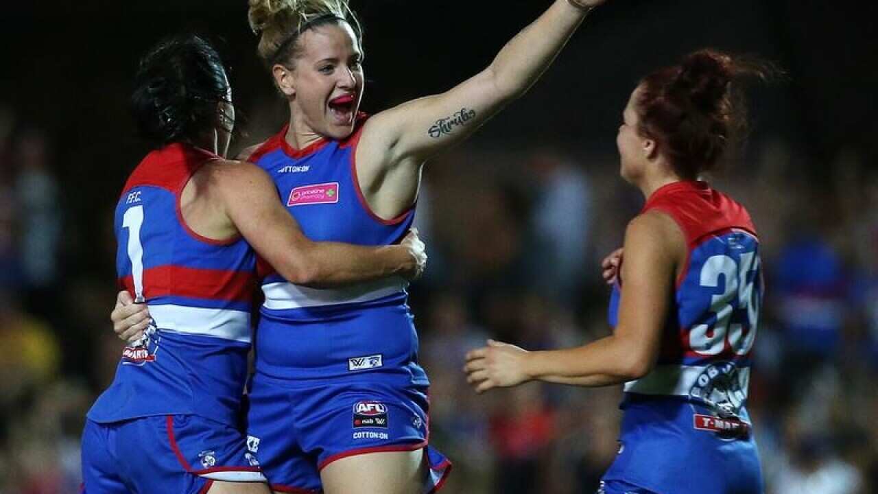 Deanna Berry (7) of the Bulldogs celebrates the winning goal