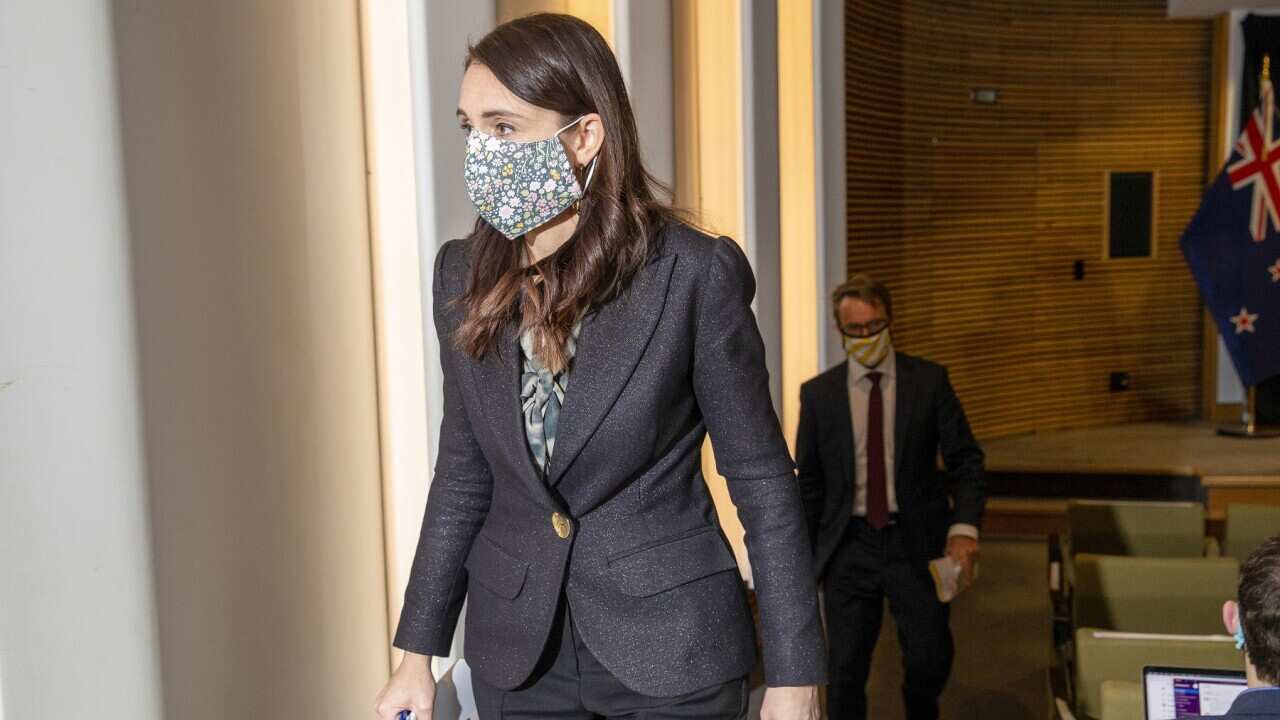 NZ PM Jacinda Ardern leaves a press conference following a COVID-19 response update