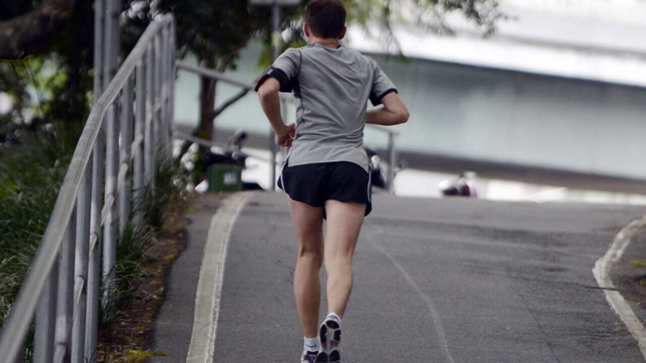 A man runs during lunch time