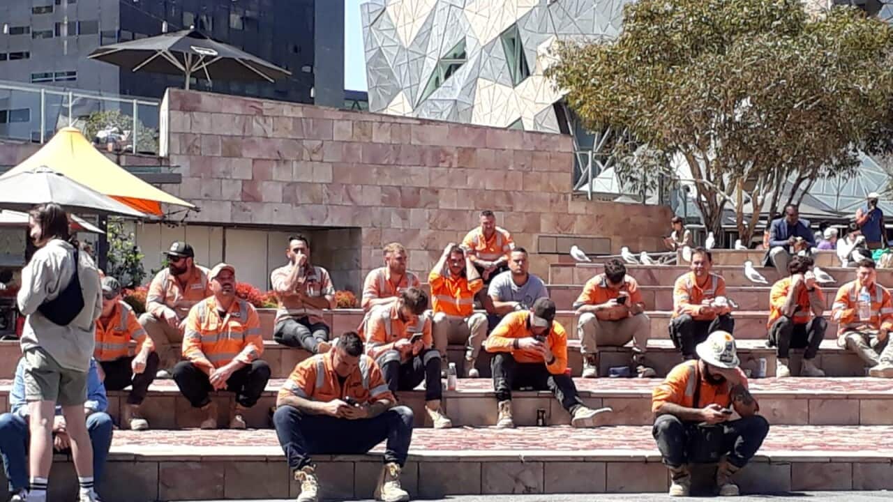 Workers having a lunch break at Federation Square, March 2023. (Courtesy – SPD).