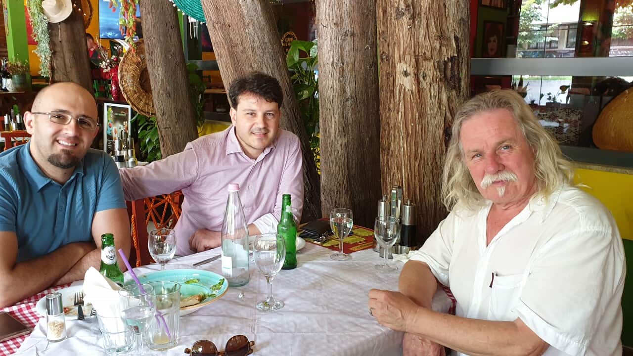 A supplied image of Australian composer Alan Holley with Albanian composers Ilir Kodhima & Dorian Cene.