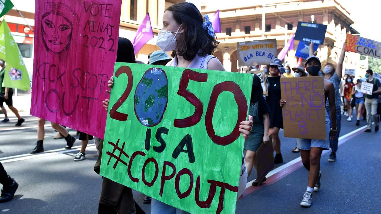 Thousands rally in Sydney calling for greater action to address climate change.