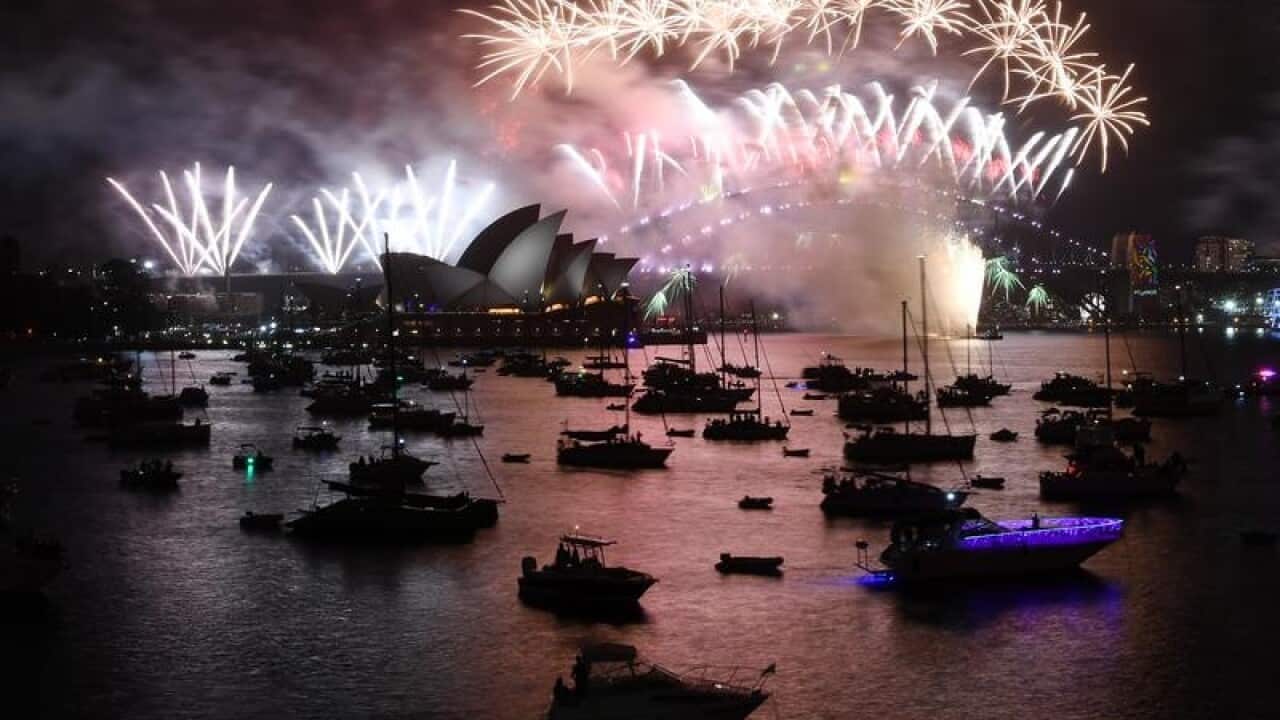 Fireworks explode over the Sydney Harbour