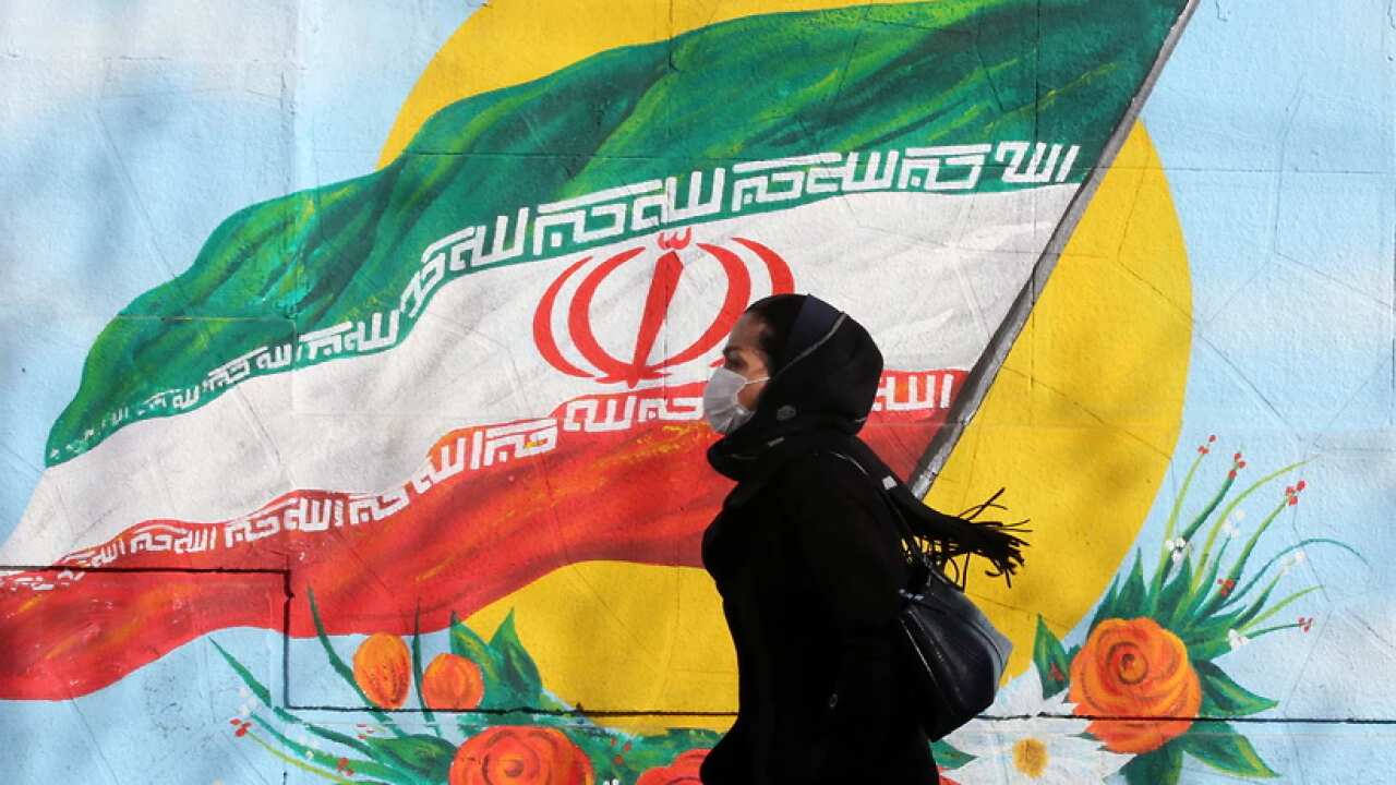 An Iranian Woman wearing a mask