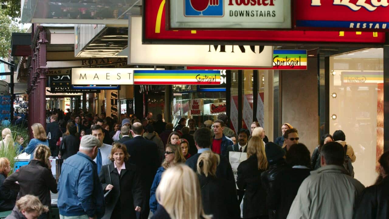 Melbourne shoppers walk down Bourke street (AAP Image/Joe Castro) 