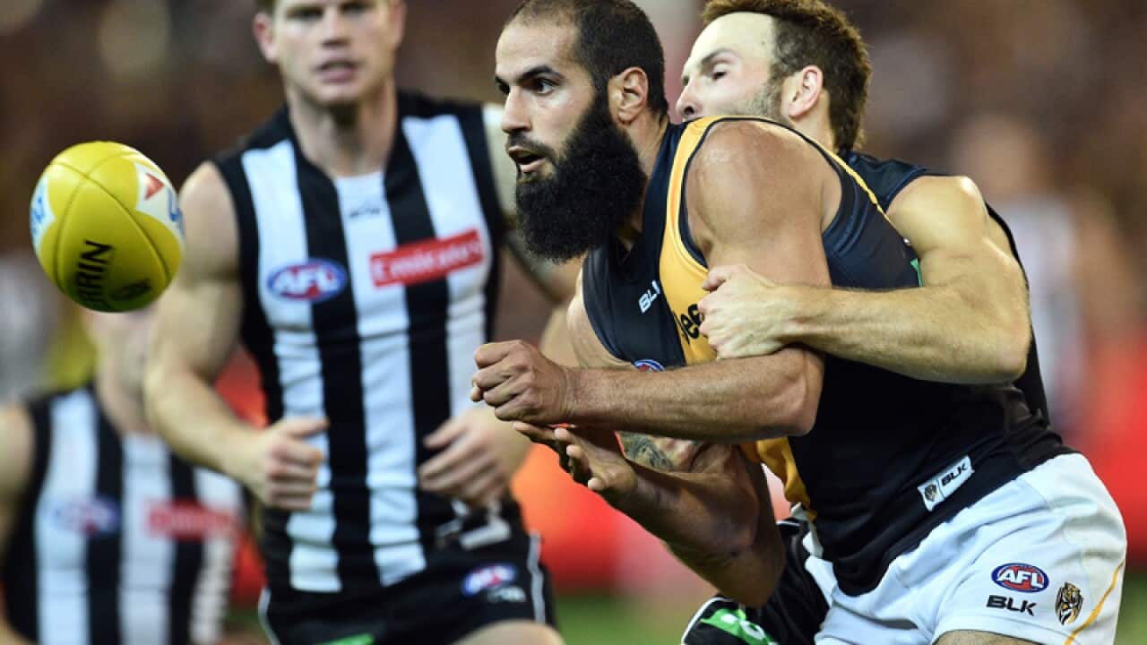 Richmond Tigers player Bachar Houli (centre)