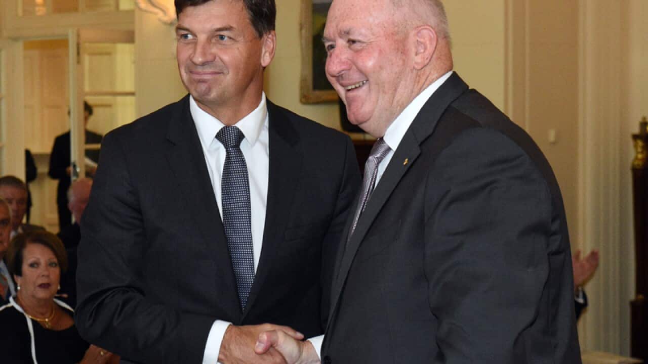 Federal frontbencher Angus Taylor (L)