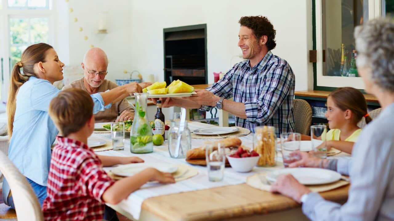 Family having meal at dining table
