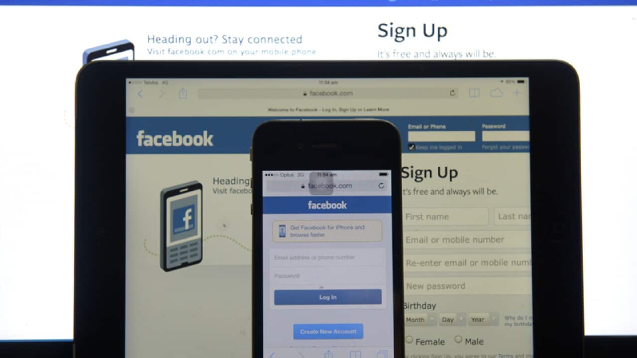 The Facebook login page on a computer, tablet and phone