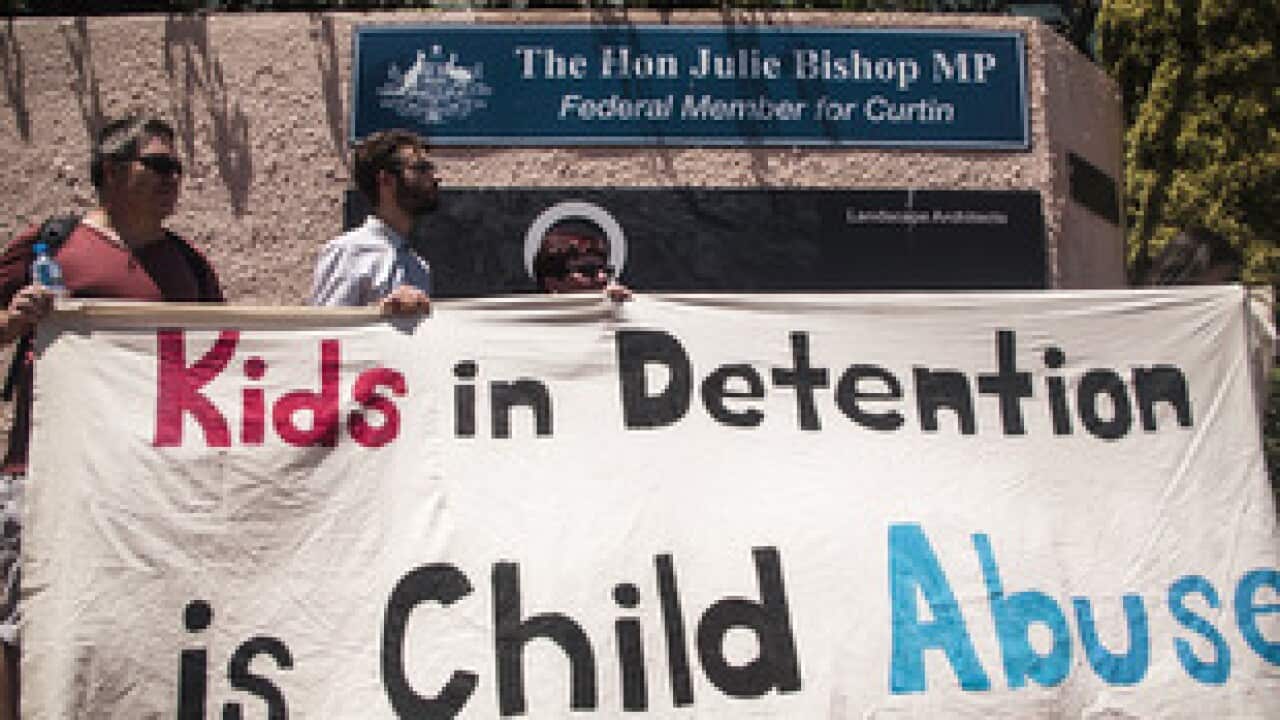 Protesters in Perth voice their opposition to the detention of asylum seeker children.