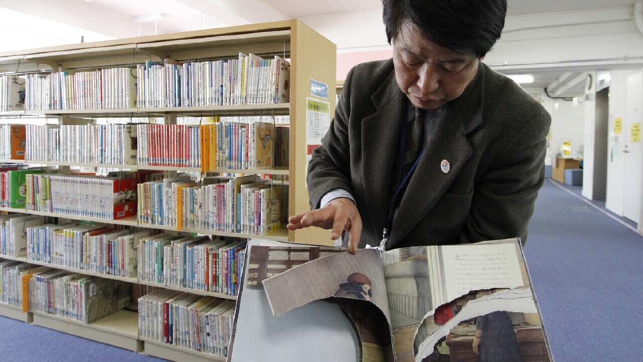 A ripped copy of Anne Frank's "Diary of a Young Girl" in Japan