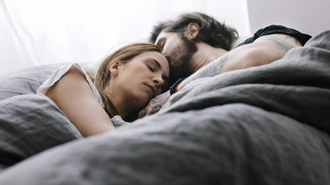 Couple sleeping in Bed together