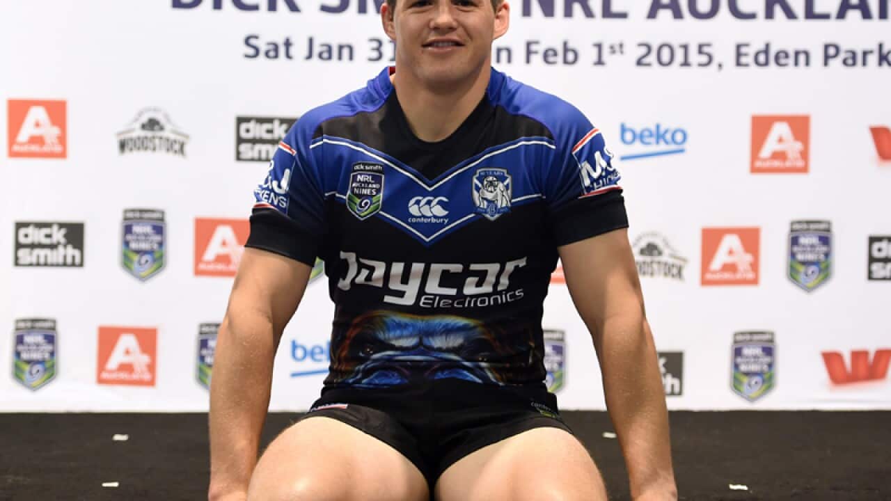 Brett Morris poses with the Bulldogs jersey