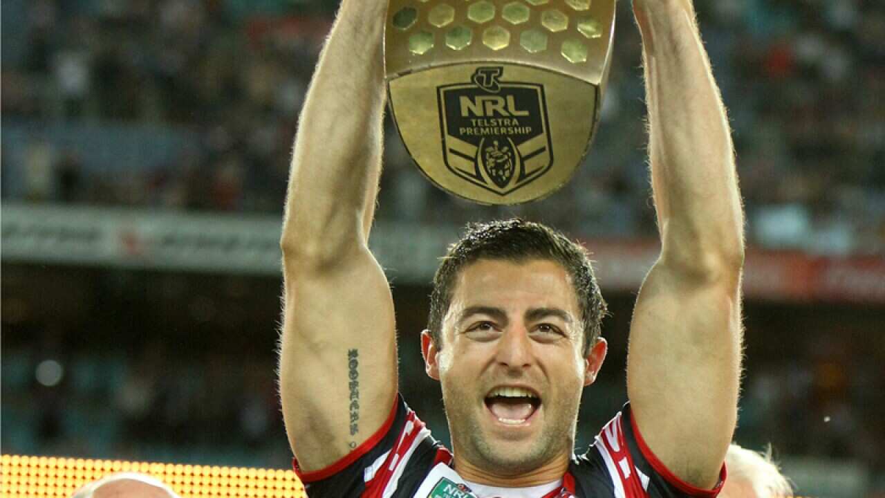 Sydney Roosters player Anthony Minichiello celebrates