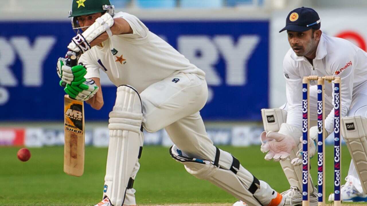 Junaid Khan, left, is bowled lbw by Rangara Herath