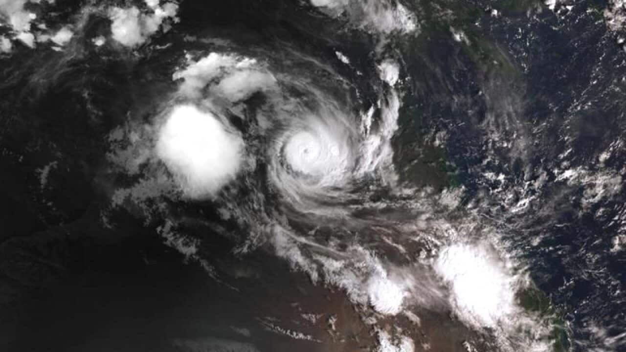 Tropical Cyclone Owen is expected to cross the Queensland coast on Friday.