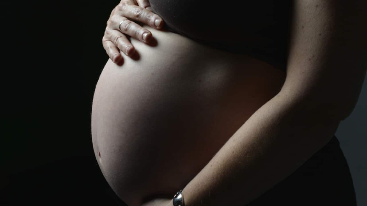 A stock image of a pregnant woman.