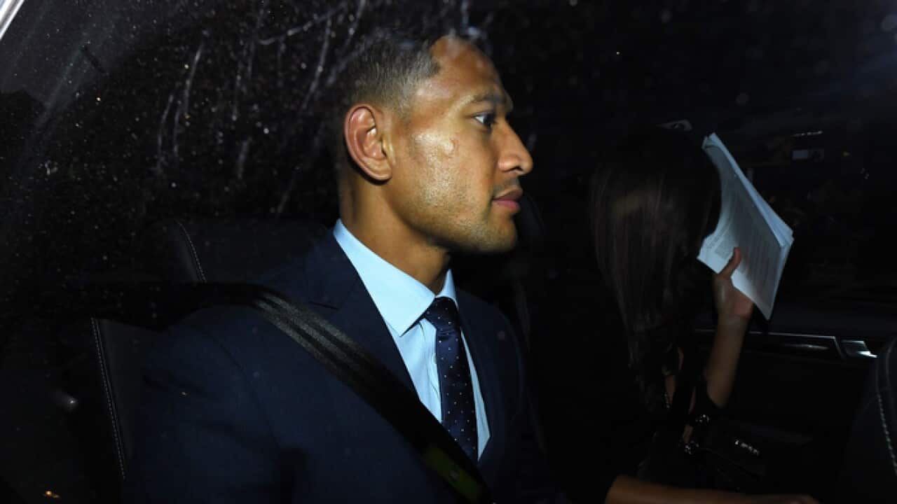 Israel Folau leaves a Code of Conduct hearing in Sydney in May