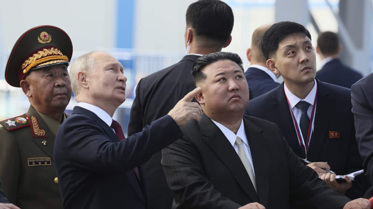 Russian President Vladimir Putin and North Korea's leader Kim Jong Un examine a launch pad during their meeting at the Vostochny cosmodrome on Wednesday, Sept. 13, 2023.