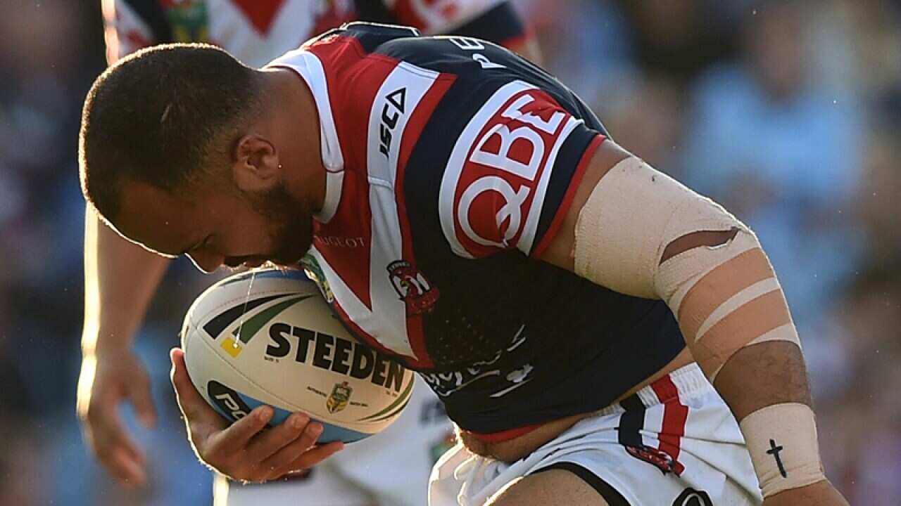 Sam Moa (right) of the Roosters