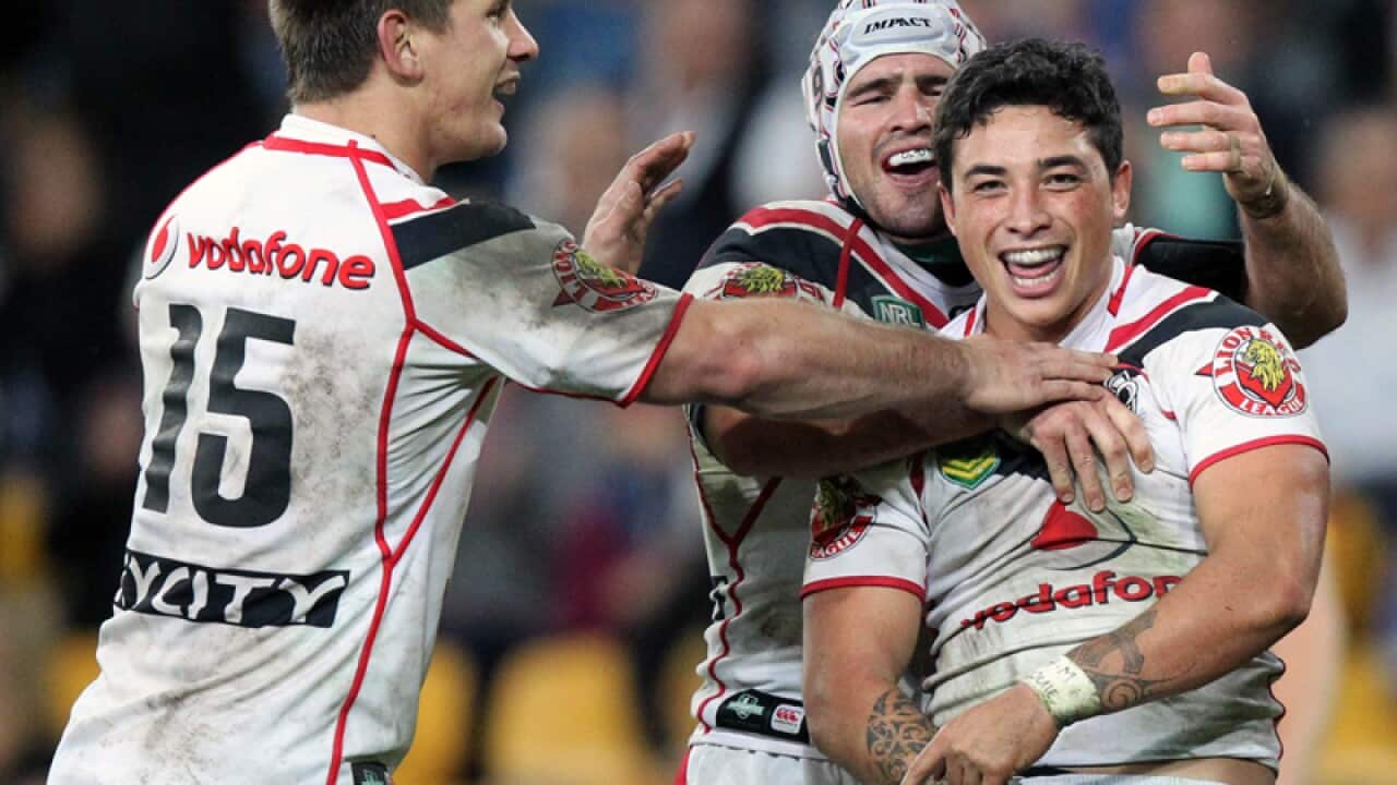 Kevin Locke celebrates scoring a try