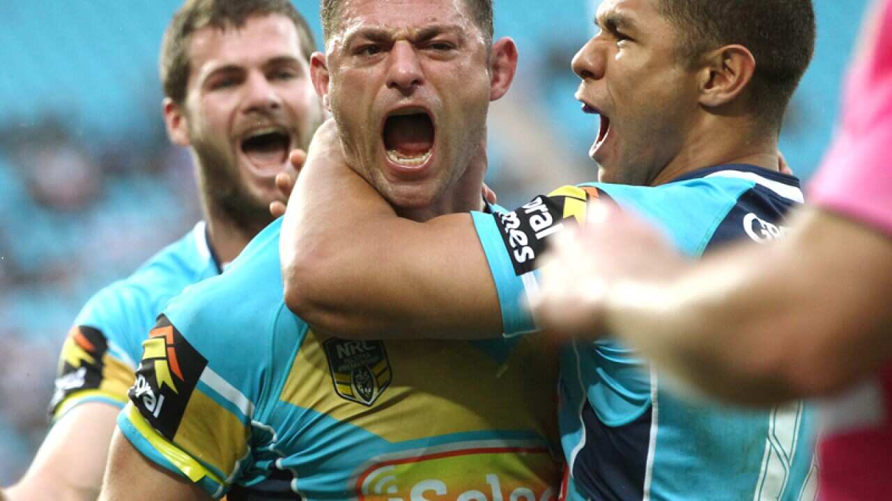 Mark Minichiello celebrates after scoring