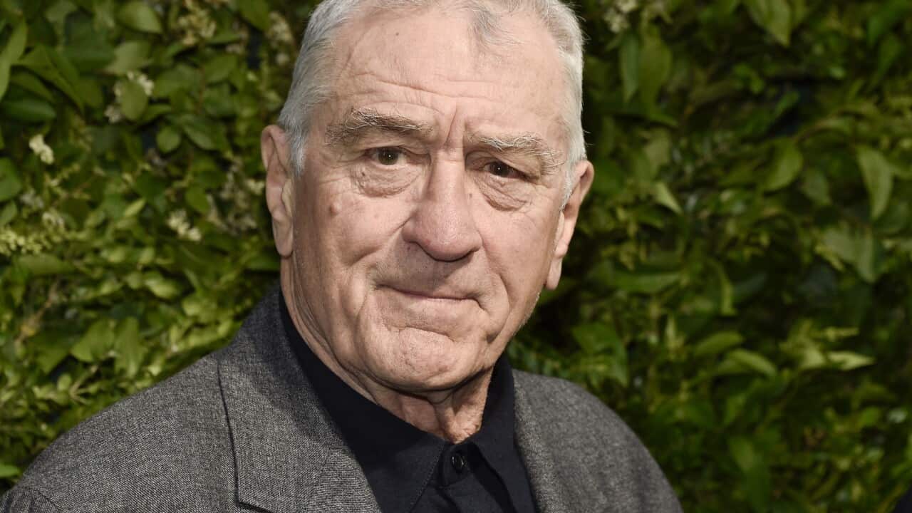 A man posing for a photo.