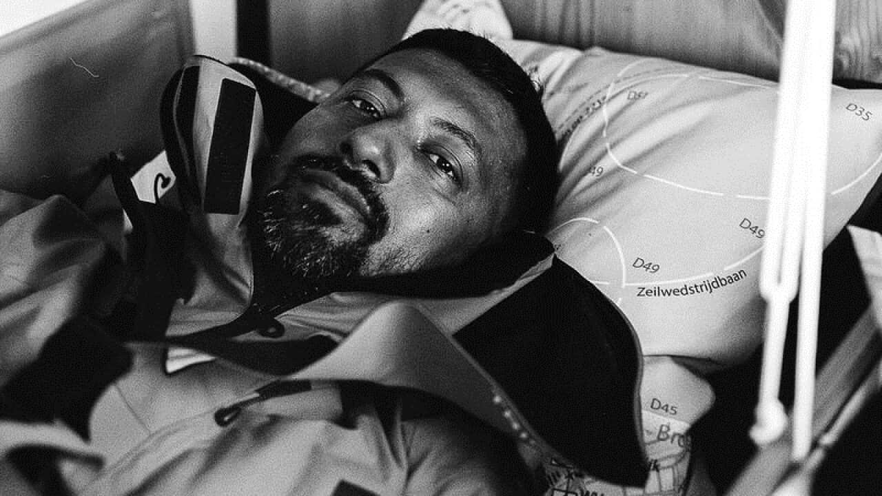 Abhilash Tomy lying in his bunk