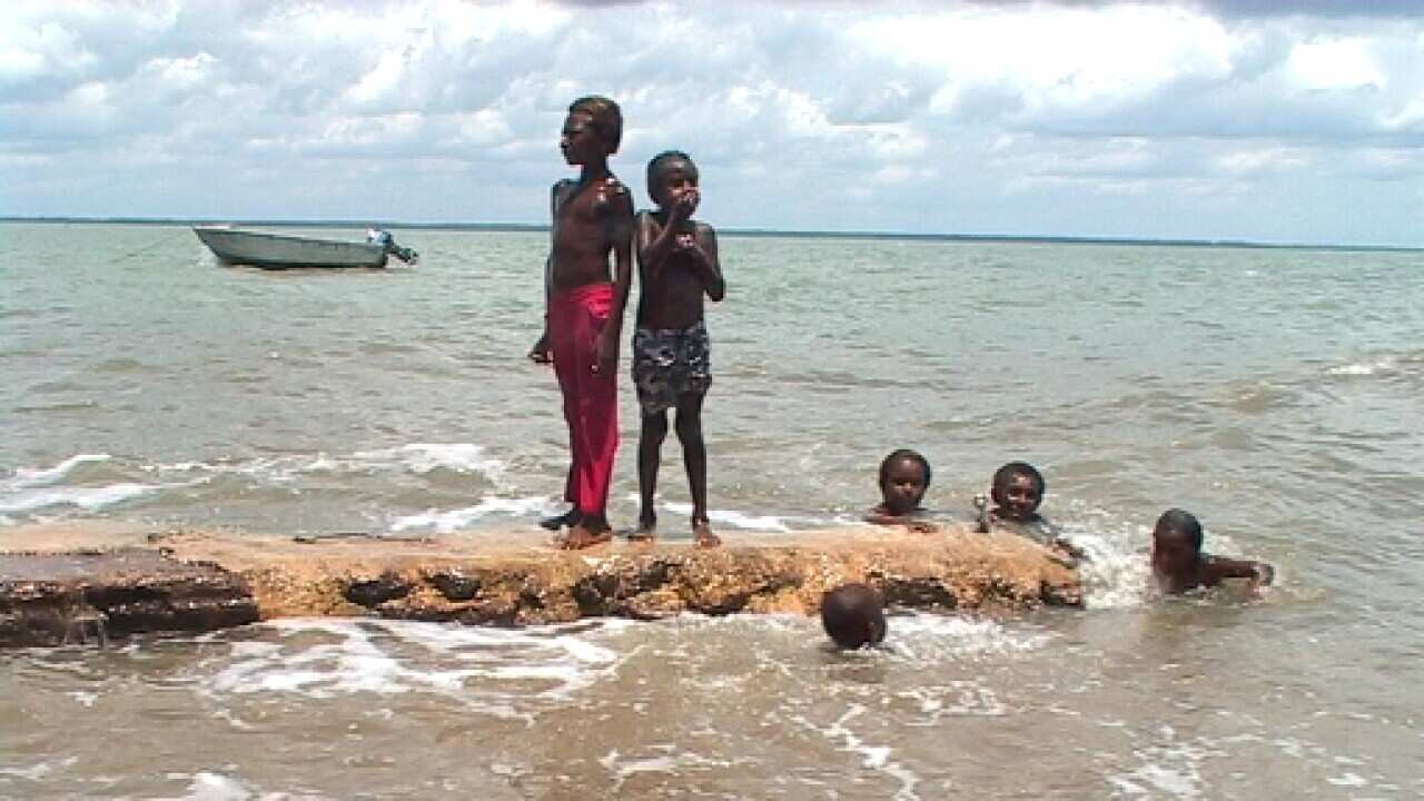 sea walls kids saibai.jpg