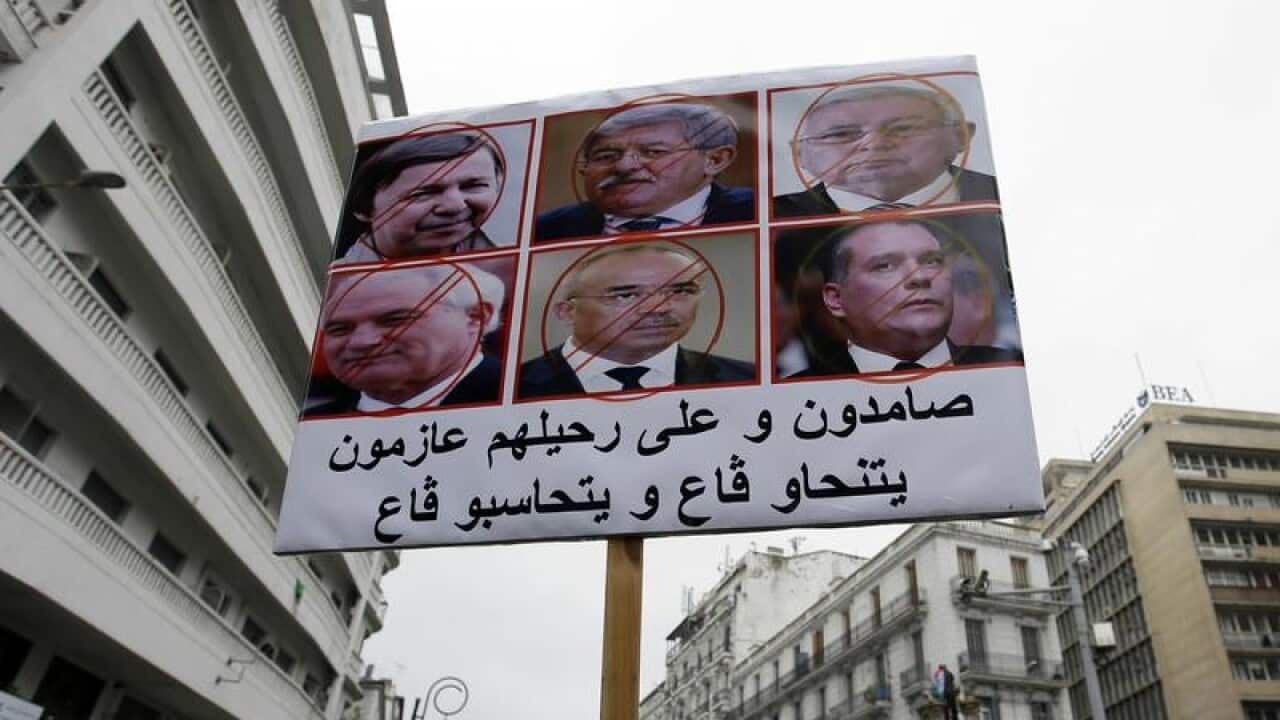 Anti-government protesters march in Algiers