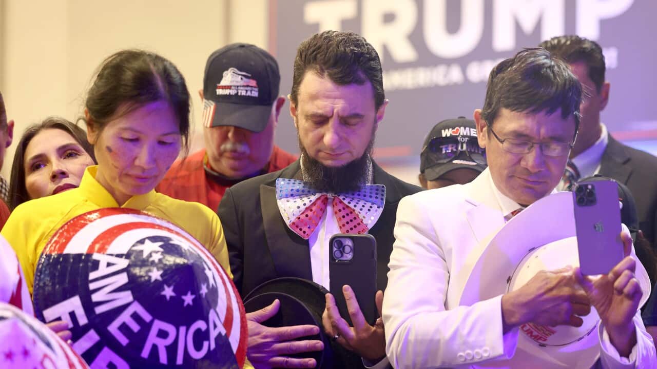 People of different ethnicities pray