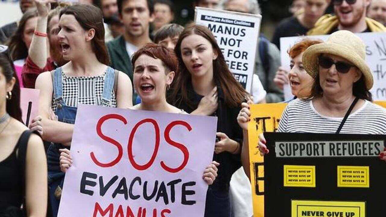 Protesters have rallied in Sydney to demand refugees on Manus Island be brought to Australia.