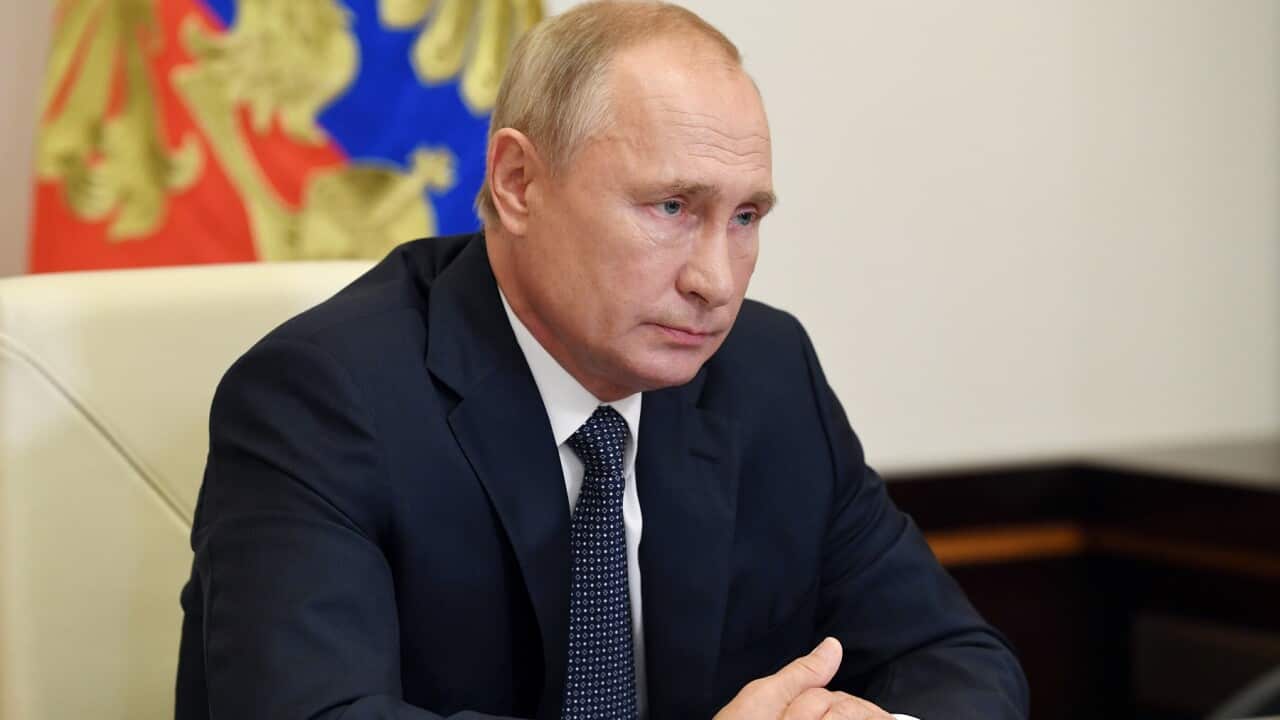 Russian President Vladimir Putin receives a report of the Healthcare minister about registration of the tested and registered coronavirus vaccine.