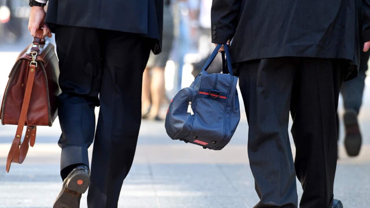 Office workers walking in central Brisbane