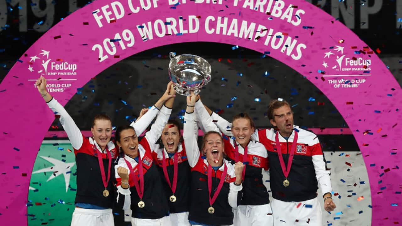 Team France celebrates winning the Fed Cup Final.
