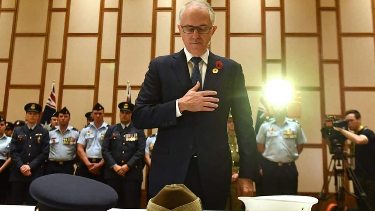 Malcolm Turnbull has joined NZ counterpart Jacinda Ardern in Vietnam to commemorate Remembrance Day.