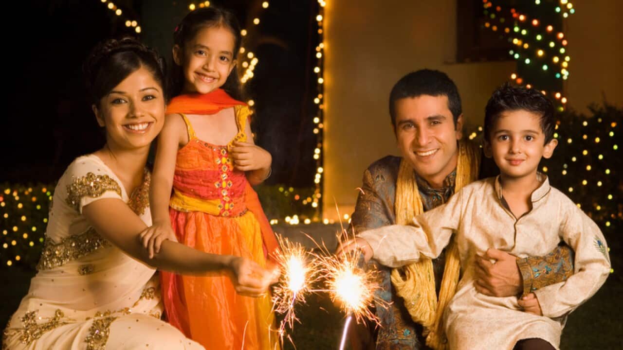 Family celebrating diwali