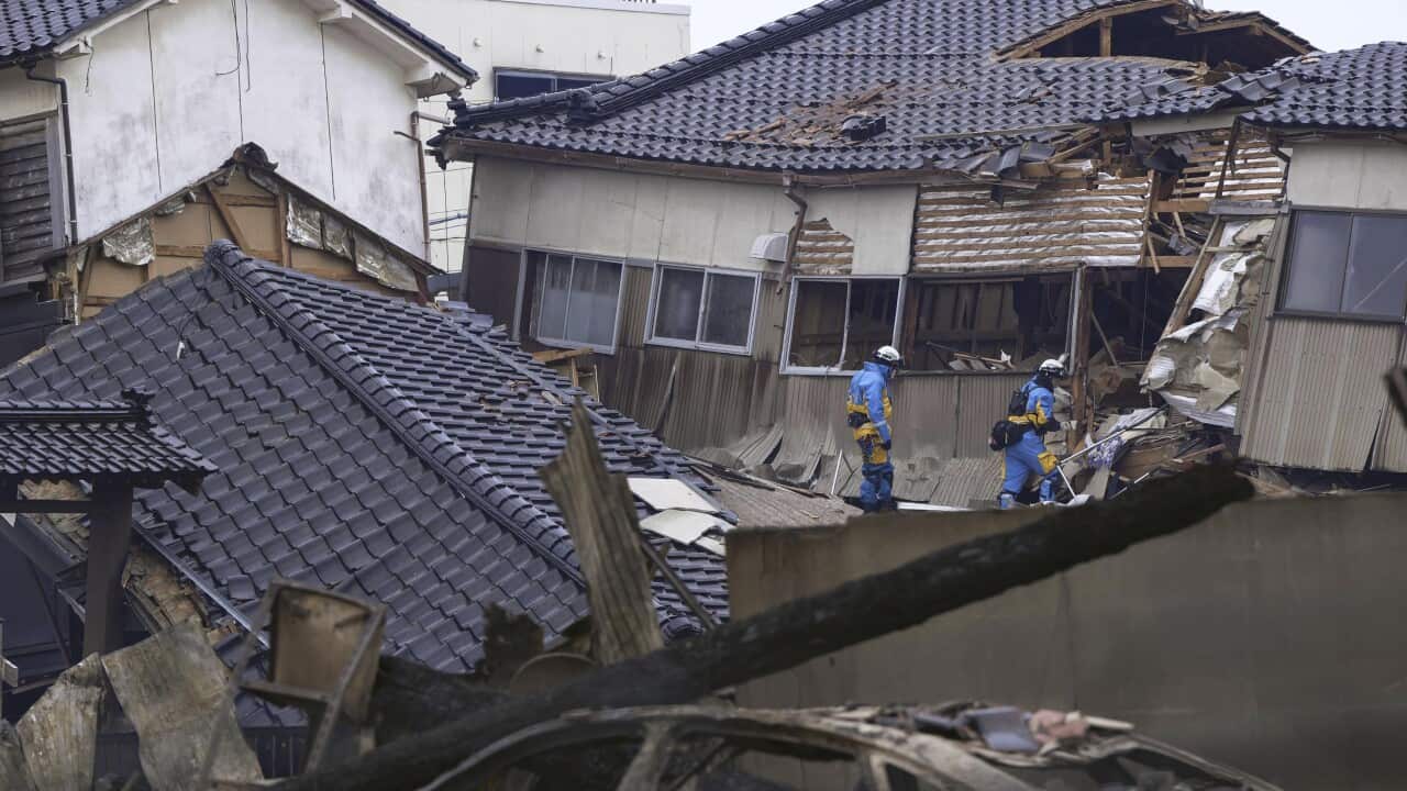 Japan in 'battle against time' to rescue survivors after nearly 50 killed in earthquake | SBS News