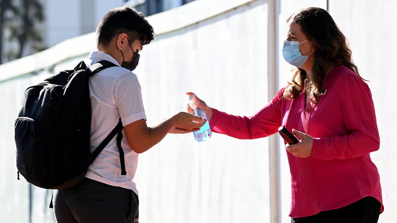 Hand sanitiser and face masks provided to students at Fairvale High School in Sydney.
