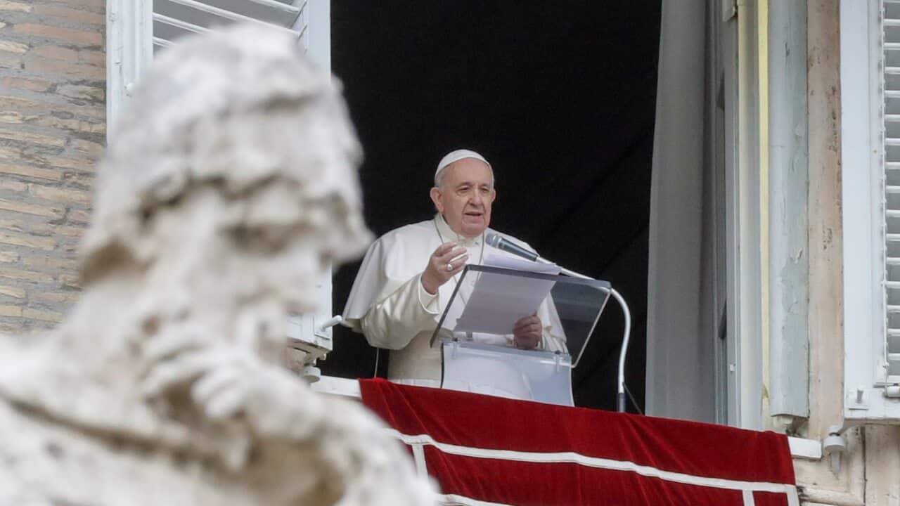 Pope Francis delivers his message from the window of his studio overlooking St.Peter's Square